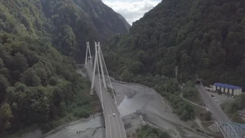 Aerial around cable-stayed bridge Adler road Krasnaya polyana Sochi Russia Stock Footage 289650979