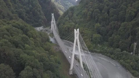 Aerial around cable-stayed bridge Adler road Krasnaya polyana Sochi Russia Stock Footage 289651031