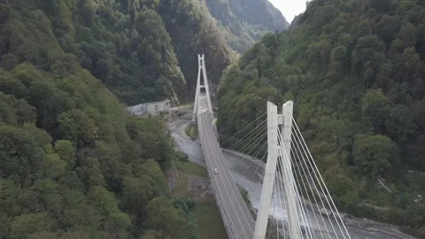 Aerial around cable-stayed bridge Adler road Krasnaya polyana Sochi Russia Stock Footage 289651069