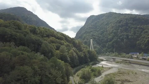 Aerial around cable-stayed bridge Adler road Krasnaya polyana Sochi Russia Stock Footage 289651263