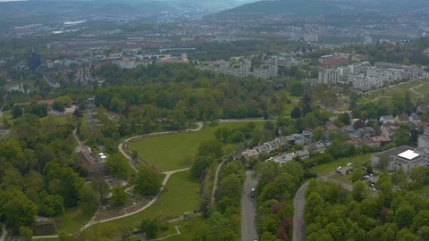 Aerial around the Killesberg in spring  in Stuttgart, Germany. Video stock 107696076