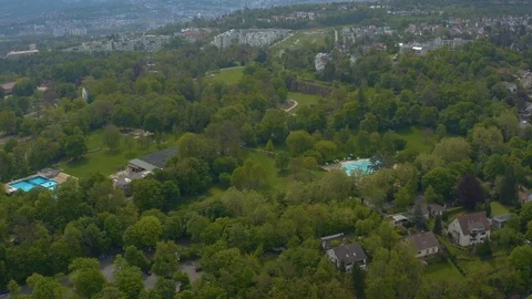 Aerial around the Killesberg in spring  in Stuttgart, Germany. Stock Footage 107697804