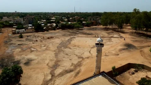 Aerial around a small mosque in Ouaga Stock Footage 80352603