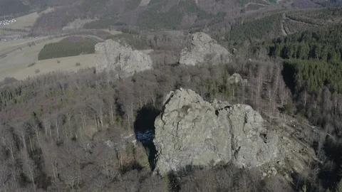 Aerial around summit massive rocks in Sauerland, Germany Stock Footage 103479043