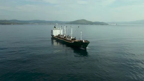 Aerial Around view, Cargo Ship, Cranes, Morning, Calm Stock Footage 163095089