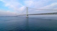 Aerial Ascending - Akashi Kaikyo Bridge Seen From Awaji Island Stock Footage