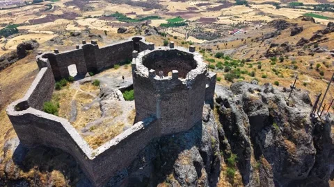 Aerial Ascending Pullback from Ancient Stone Fortress Revealing Historic Stock Footage 339616451