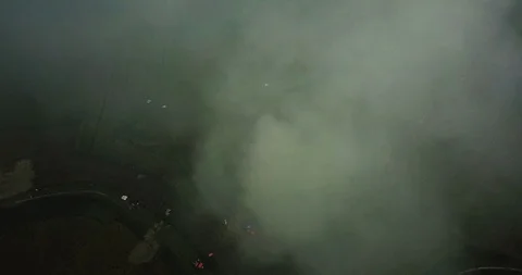 Aerial ascending shot through ghost like cloud. Scary overhead shot of the Stock Footage 113687112