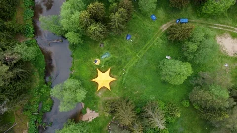 Aerial ascending top-down view video of small curvy river in eastern europe Stock Footage 169925854