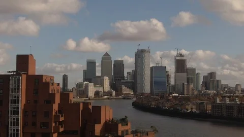 Aerial ascending view of the financial district of the Docklands in London 動画素材 101203244