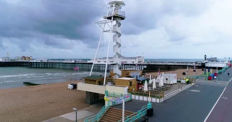 Aerial ascending view of new zip line attraction on the seafront in Brighton Stock Footage 78416397