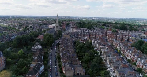 Aerial ascending view of a typical Edwardian Victorian village in North London Stock Footage 77755906