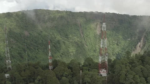 Aerial ascends and tilts down over crater of Boqueron in El Salvador Stock-Footage 168271128