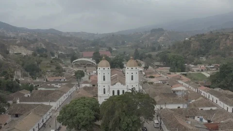 Aerial ascends while tilting down above the plaza of Playa de Belen, Colombia Stock-Footage 127384516