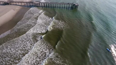 Aerial Atlantic Ocean Pull Out from pier Stock Footage