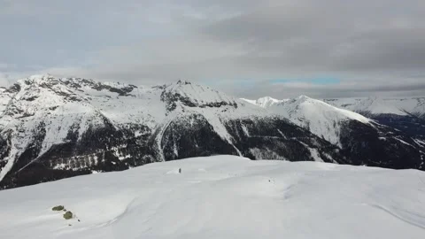 Aerial of Austrian mountains in winter Stock Footage 145804422