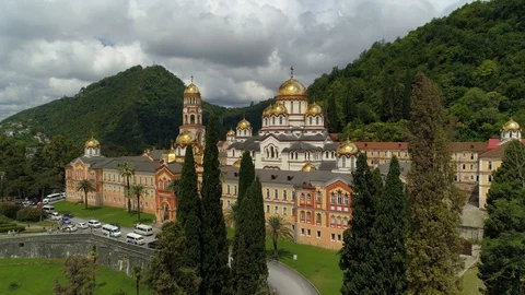 Aerial authentic New Athos Monastery religious Abkhazia attraction church Stock Footage 128621405