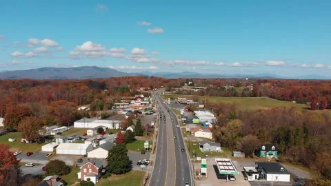 Aerial of Autumn Down Town with Clouds and Mountains Stock-Footage 145228158