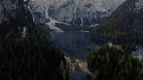 Aerial autumn sunrise scenery with yellow larches, alpine lake Stock Footage