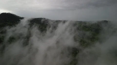 Aerial back away from low clouds in Blowing Rock North Carolina in springtime Stock Footage 307418877
