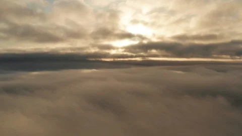 Aerial background between two layers of cloud above and below Stock Footage 118592323
