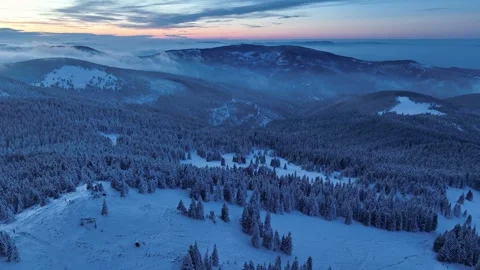 Aerial backward flight after sunset showing twilight horizon over Beskid Stock Footage 336365650