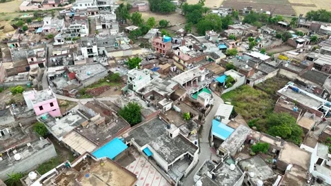 Aerial Backward Flight Over Crowded Village in Punjab. Stockbeeldmateriaal 333069930