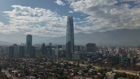 Aerial backward hyperlapse pulling away from the Costanera Center skyscrape.. Video stock 339210396