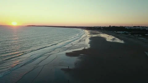 Aerial backward view of Los Bateles beach coastline in Conil de la Frontera Stock Footage 155690995