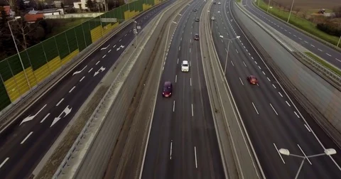 Aerial Backwards Shoot Of A Highway Stock Footage 84505904