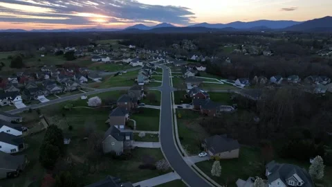 Aerial backwards shot of new developed district with detached single family Stock Footage 307640596