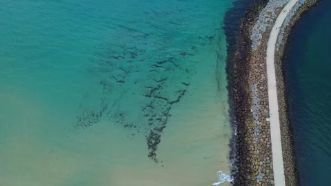 Aerial Beach &amp; Break wall Stock Footage 331619713