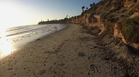 Aerial Beach &amp; Cliffs at Sunset Stock Footage 41647153