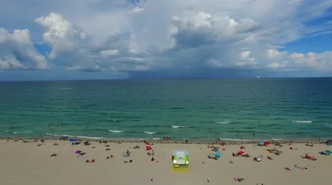 AERIAL - Beach day Stock Footage 65153939