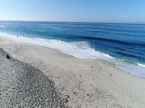 Aerial: beach to ocean Stock Footage 83879741