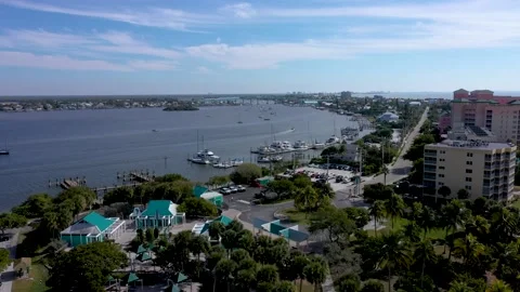Aerial Beach sweep docks behind hotel Fort Myers Stock Footage 156404256