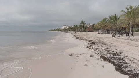Aerial Beach Waves on White Sand Pull Back Shot 6K LOG Stock Footage 199874189