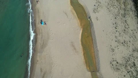 Aerial beasch and wave Stock Footage 237477913