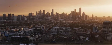 Aerial of beautiful cityscape during sunrise Stock Footage