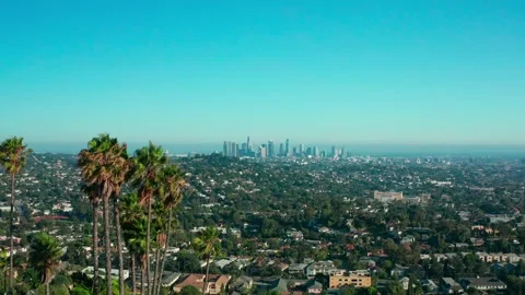 Aerial of beautiful downtown Los Angeles on blue sky sunny day in California Stock Footage