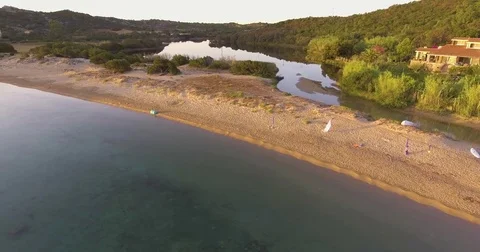Aerial, beautiful empty beach in a bay in Sardinia island on sunrise 스톡 동영상 78941069
