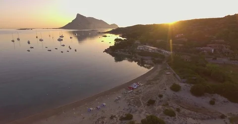 Aerial, beautiful empty beach in a bay in Sardinia island on sunrise 스톡 동영상 78941215