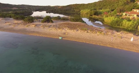 Aerial, beautiful empty beach in a bay in Sardinia island on sunrise Stock-Footage 82644096