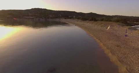 Aerial, beautiful empty beach in a bay in Sardinia island on sunrise Stock Footage 85304583