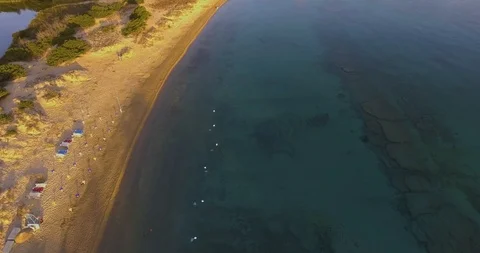Aerial, beautiful empty beach in a bay in Sardinia island on sunrise 스톡 동영상 87999644