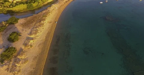 Aerial, beautiful empty beach in a bay in Sardinia island on sunrise 스톡 동영상 89206756