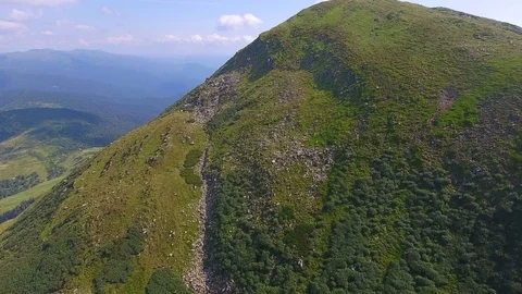 Aerial: beautiful mountain range summer landscape Stock Footage 79787093