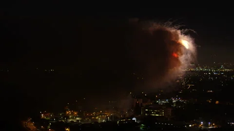 Aerial Beautiful Shot Of Fireworks Exploding, Drone Flying Backwards Over Houses Stock Footage 169497398