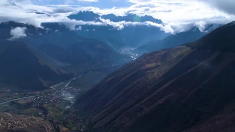 Aerial of beautiful terraced fields on the mountain slopes on a foggy day Stock-Footage 79678902