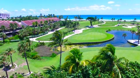 Aerial - Beautiful view of Golf Course next to ocean : Golf resort Stock Footage 66240701